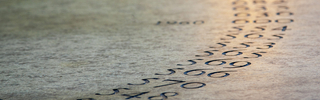 Detail of numbers carved into Maya Lin's Women's Table sculpture